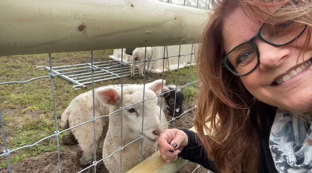 Debbie Flint with a lamb