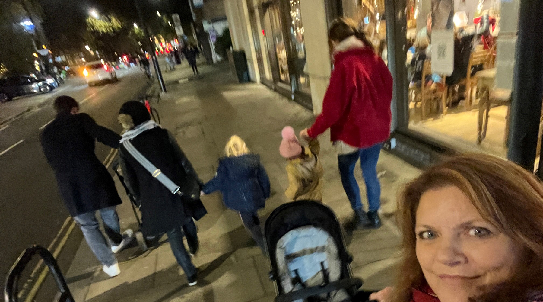 Debbie and her family walking down a high street
